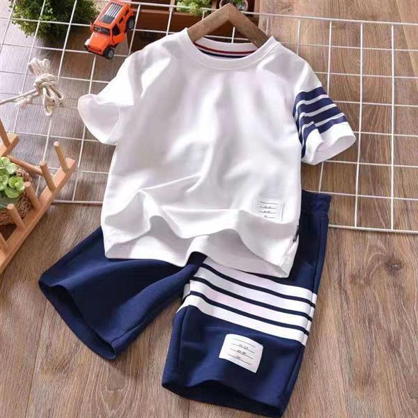 ست تیشرت سفید با شلوارک سورمه ای فشن طرح چهار خط کد 16478