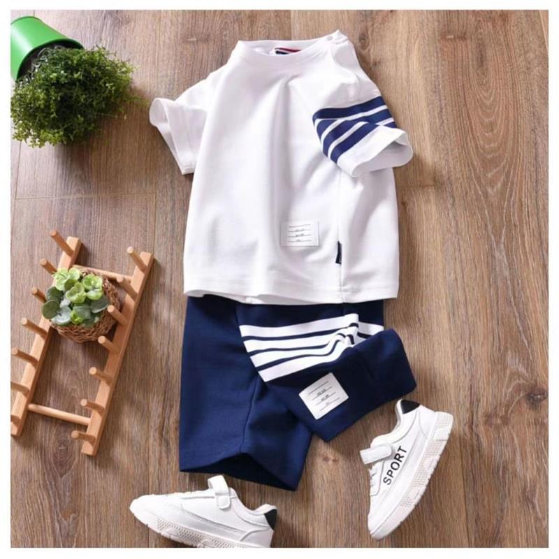 ست تیشرت سفید با شلوارک سورمه ای فشن طرح چهار خط کد 16478