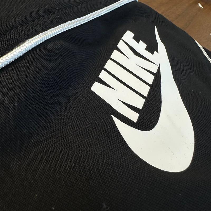 ست تیشرت سفید طرح NIKE با شلوارک اسلش مشکی کد 19816