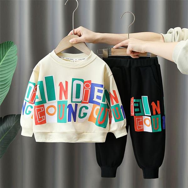 ست دورس شیری و شلوار  اسلش مشکی طرح Colorful English writing کد 21042