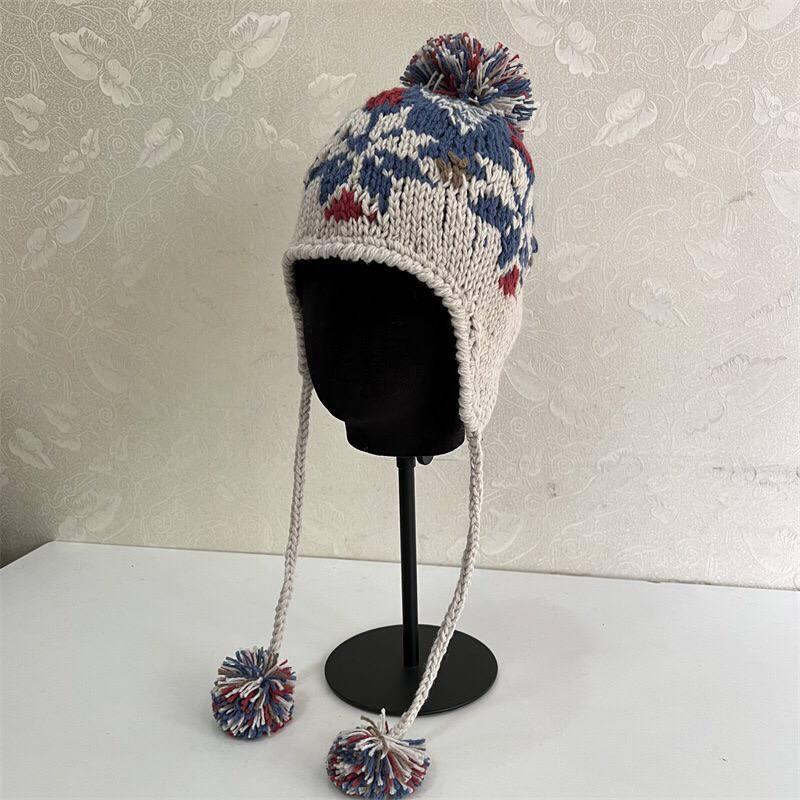 کلاه بافت گوش گیر بند پوم دار طرح Winter snow  کد 21243