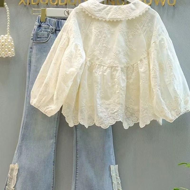 ست شومیز خامه دوزی کرم و شلوار جین ابی پایین نوار کد 21380