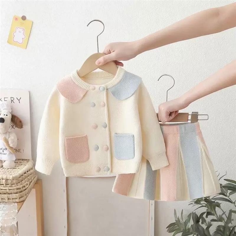 ست شومیز و دامن بافت عروسکی پشت خرگوشی شیری دو جیب صورتی ابی کد 21538